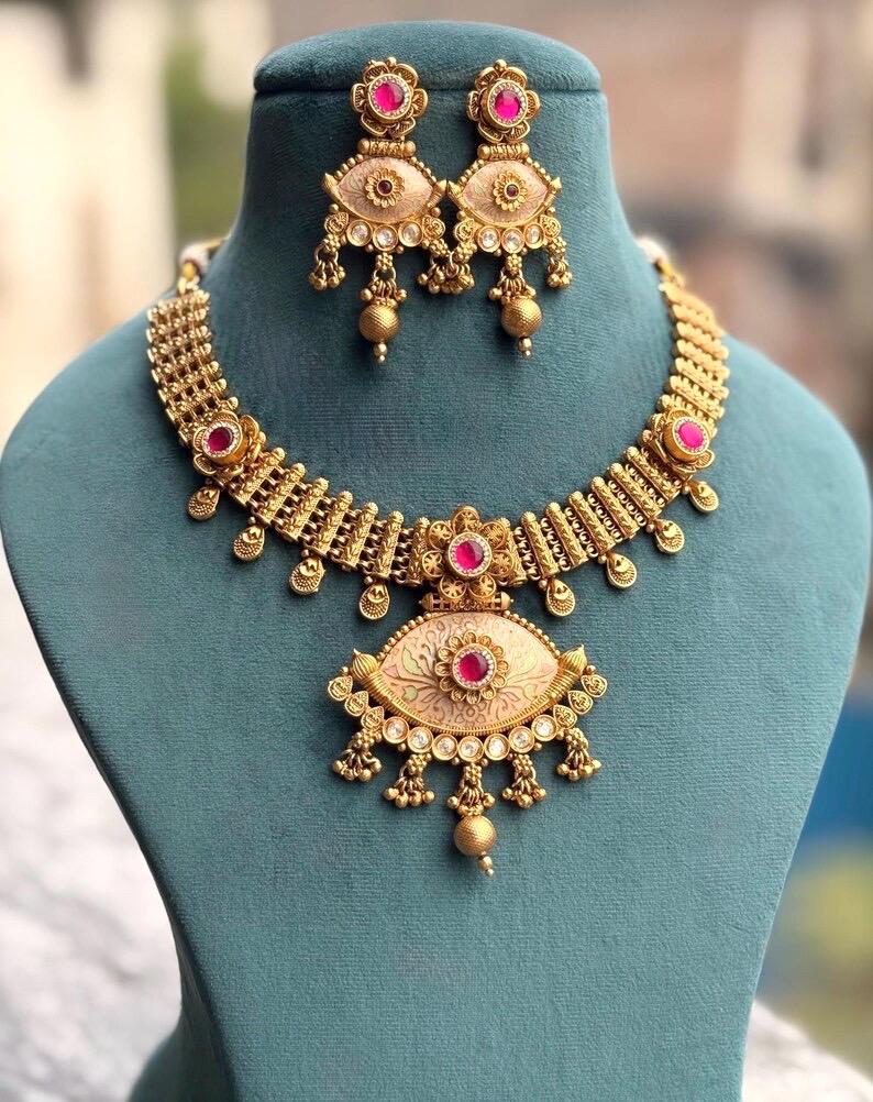 ADVIKA Gold tone Rajwadi jewellery South Indian jewelry,meenakari necklace earrings, Indian ruby stones golden jewelry, kempu temple jewelry