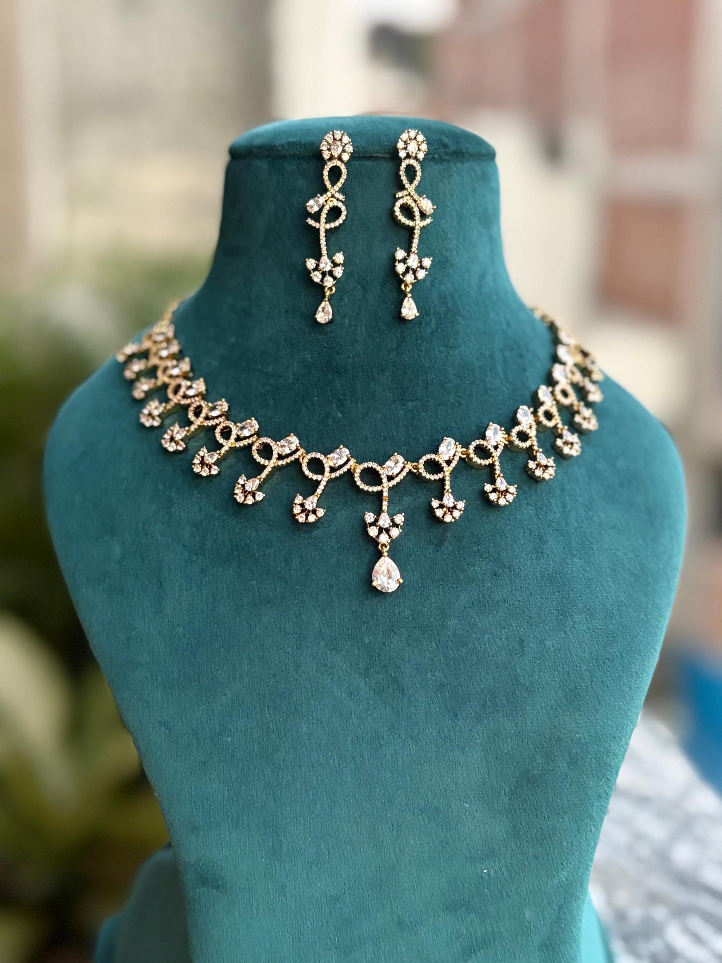 KAASHVI clear stones cz jewelry, golden mehndi polish, colourless sleek Diamond Necklace earrings,high quality Indian Pakistani jewellery