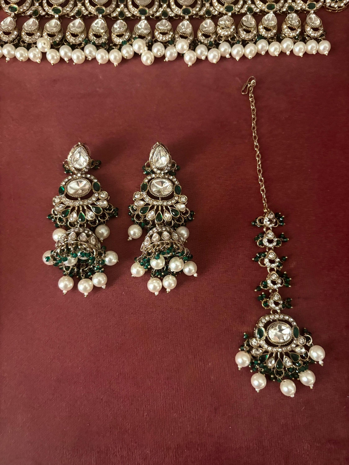 MISHAAL Green cz kundan and zircon necklace set lined with pearls in muted golden polish, Indian bridal victorian style white pearl jewelry
