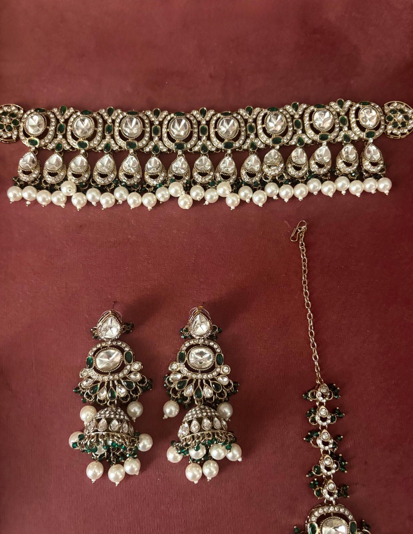 MISHAAL Green cz kundan and zircon necklace set lined with pearls in muted golden polish, Indian bridal victorian style white pearl jewelry