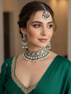 MISHAAL Green cz kundan and zircon necklace set lined with pearls in muted golden polish, Indian bridal victorian style white pearl jewelry
