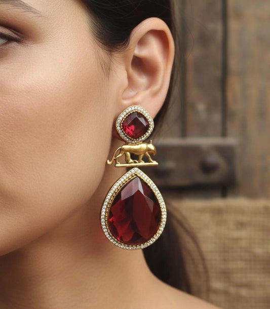 IZRA Sabyasachi inspired Ruby red earrings in antique matt gold finish , Indian fusion earrings in ruby colour, indo western jewelry