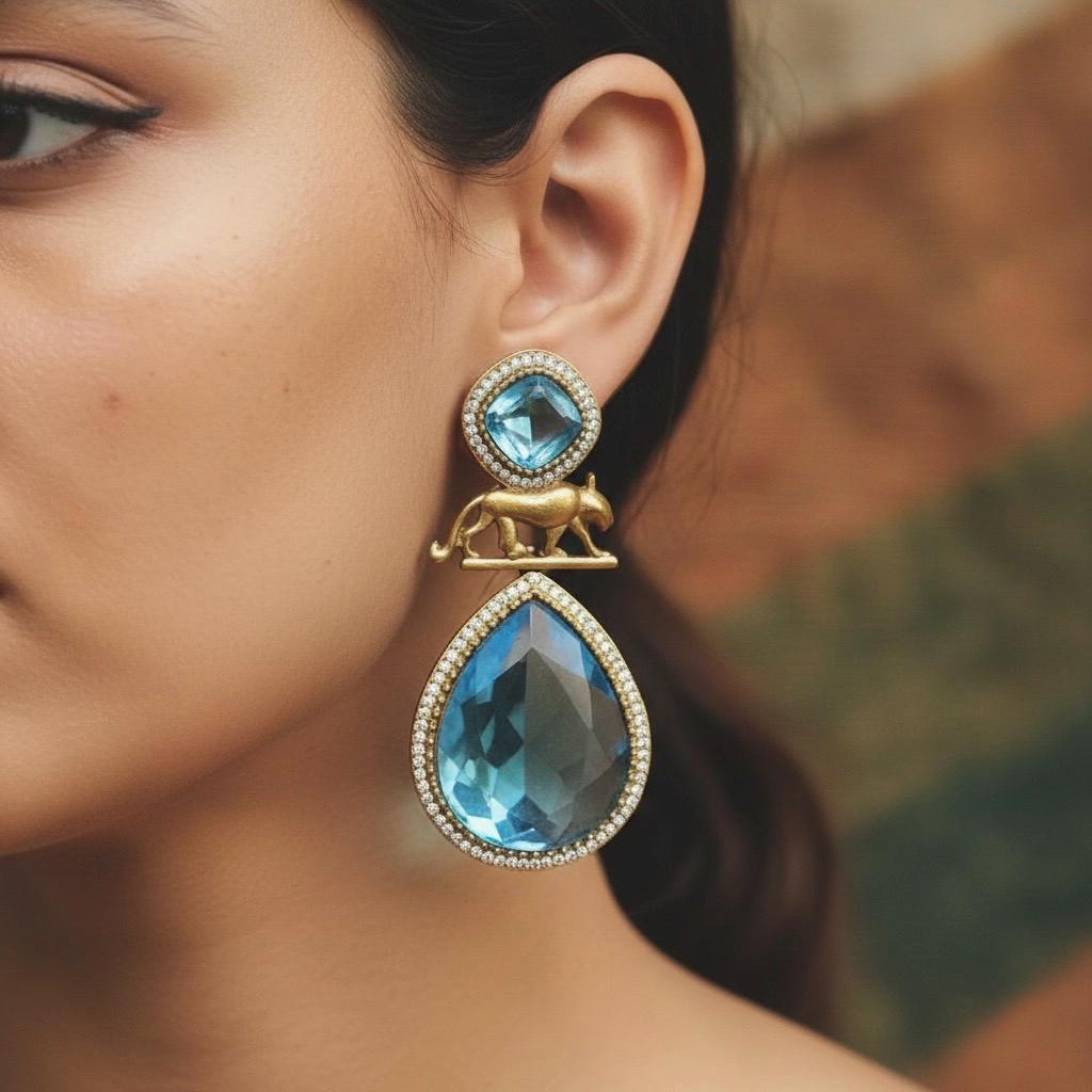IZRA Sabyasachi inspired aqua/sky blue earrings in antique matt gold finish, Indian fusion earrings in aqua colour, indo western jewelry