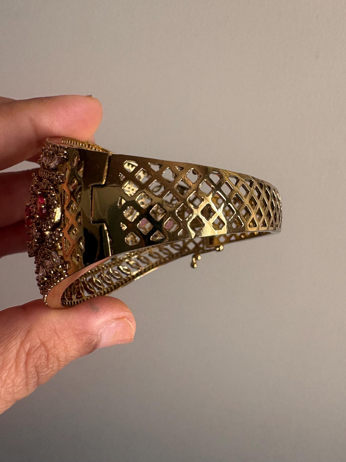 TIA green stones bracelet in antique golden polish,cz zircon openable bracelet,American diamond green colour bangle bracelet