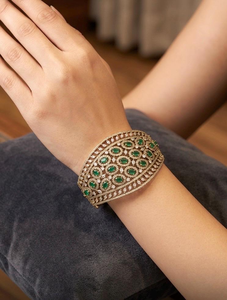 TIA green stones bracelet in antique golden polish,cz zircon openable bracelet,American diamond green colour bangle bracelet