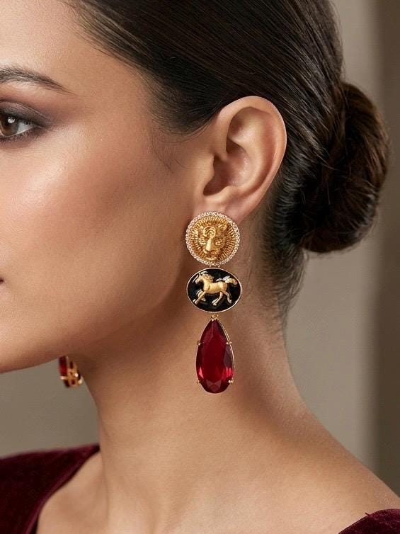 NORA Sabyasachi inspired ruby red earrings in matt golden finish, Indian fusion earrings in red colour, indian fusion jewelry