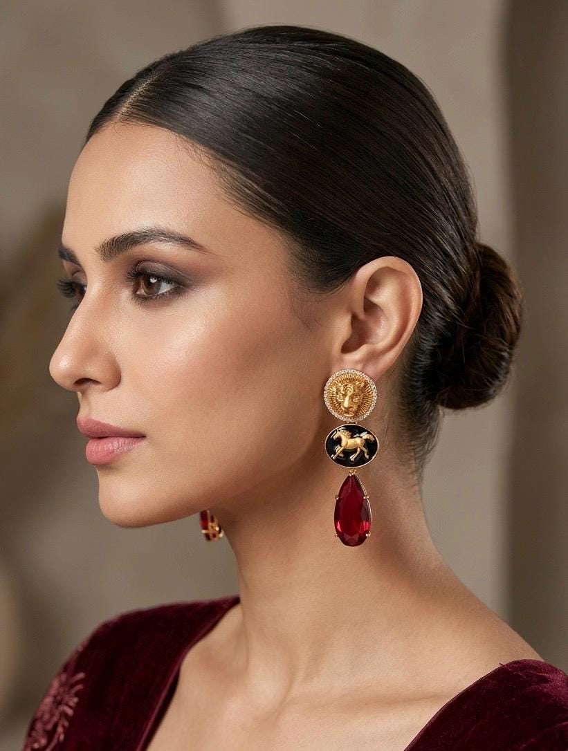 NORA Sabyasachi inspired ruby red earrings in matt golden finish, Indian fusion earrings in red colour, indian fusion jewelry